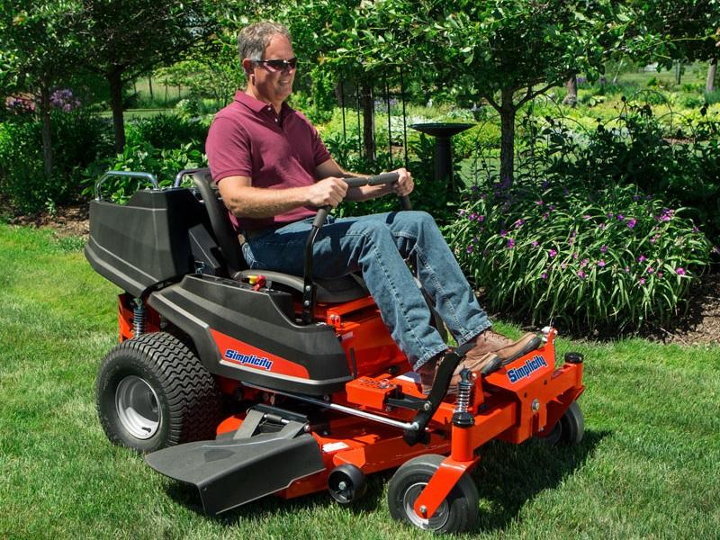 Man using his Simplicity riding zero turn mower to cut his grass to the perfect height