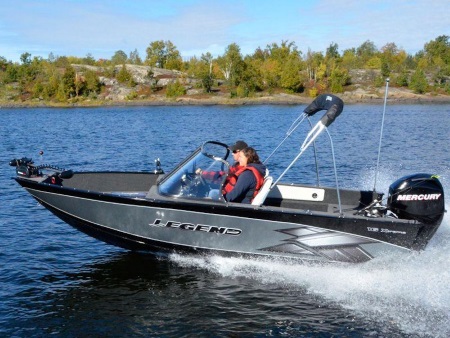 A couple on a 2013 Legend Boat Xtreme Series 16 Xtreme