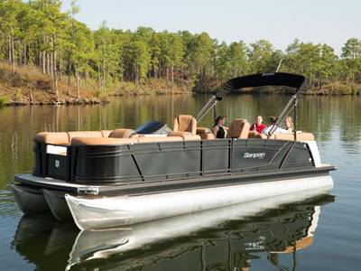 Four people relaxing on a Sanpan 2500 ULC pontoon on the water.